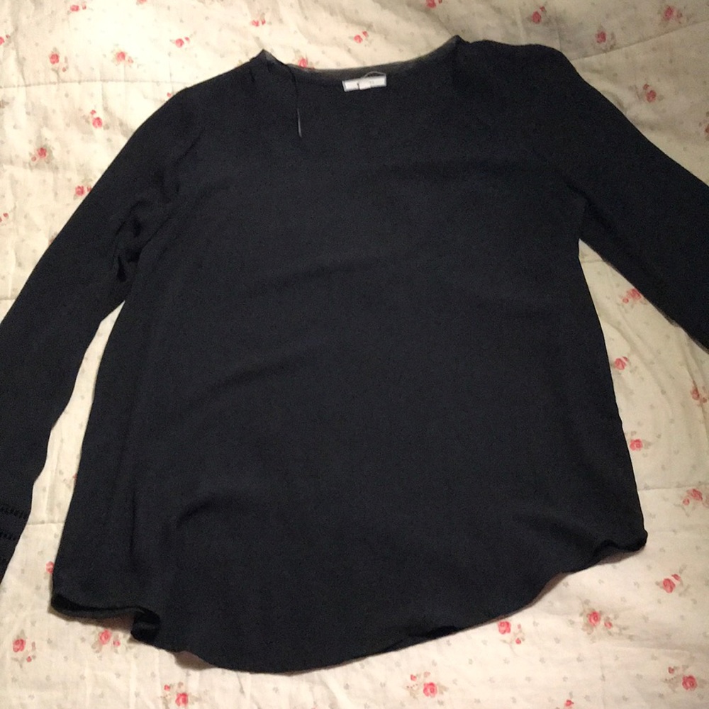 Scoop hem blouse with sleeve detail